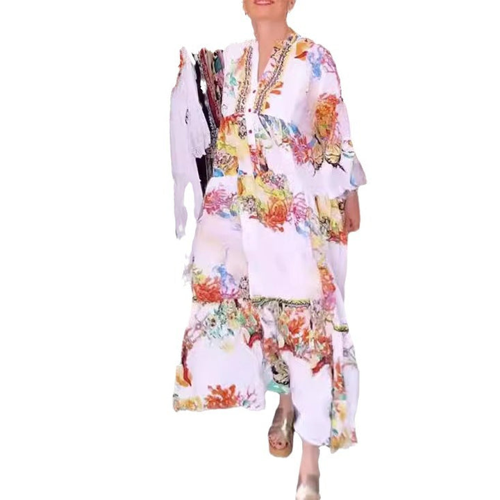 Women's airy maxi dress in layered look with V-neck, button placket, and three-quarter bell sleeves Mune Fashion