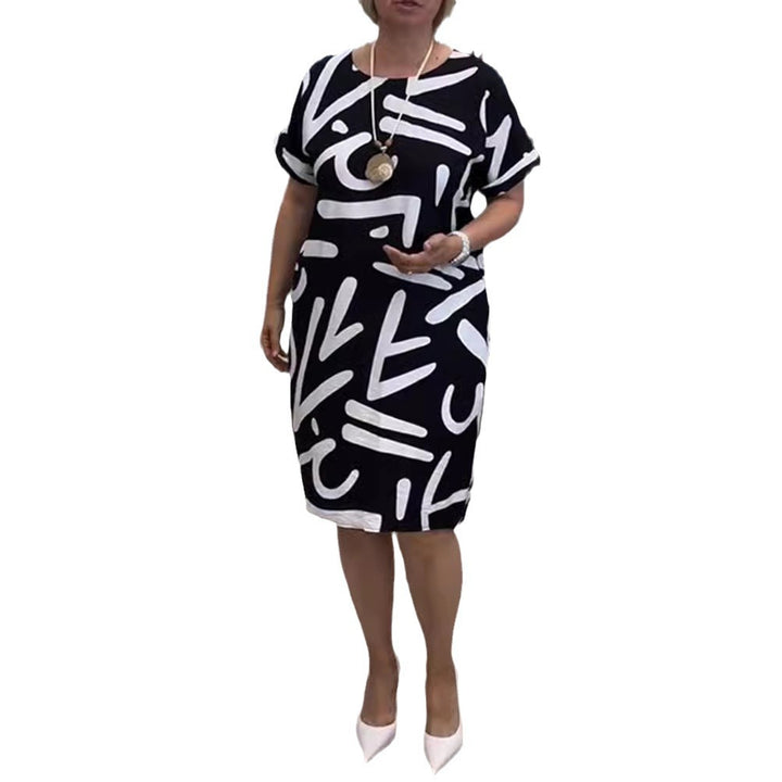 Women knee-length comfort shift dress with large brush stroke print and rolled short sleeves Mune Fashion