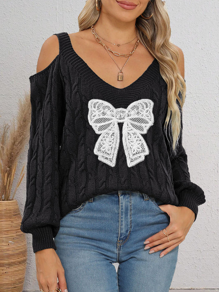 Women's stylish sweater with playfully knitted bow motif Mune Fashion