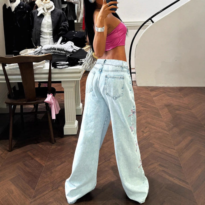 Ladies wide high-waist denim jeans with lace band belt and flared leg Mune Fashion