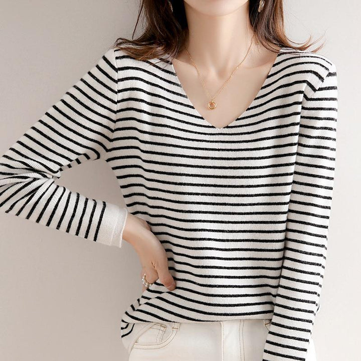 Women's delicate striped V-neck pullover made of fine rib knit with a soft drape