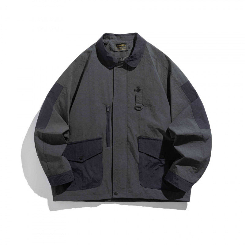 Unisex Oversize Utility-Field Jacket with patch pockets, contrast panels, and hidden zip placket Mune Fashion