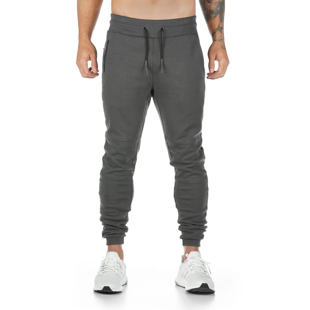Men's narrow-cut joggers with ribbed waistband, zip pocket, and knee darts Mune Fashion