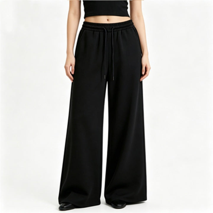 Ladies wide high-waist lounge pants with elastic waistband, drawstring, and flowing jersey Mune Fashion