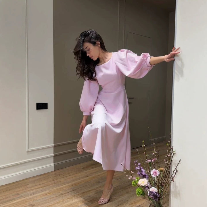 Women's midi dress with open back cutout, voluminous puff sleeves and tie belt Mune Fashion