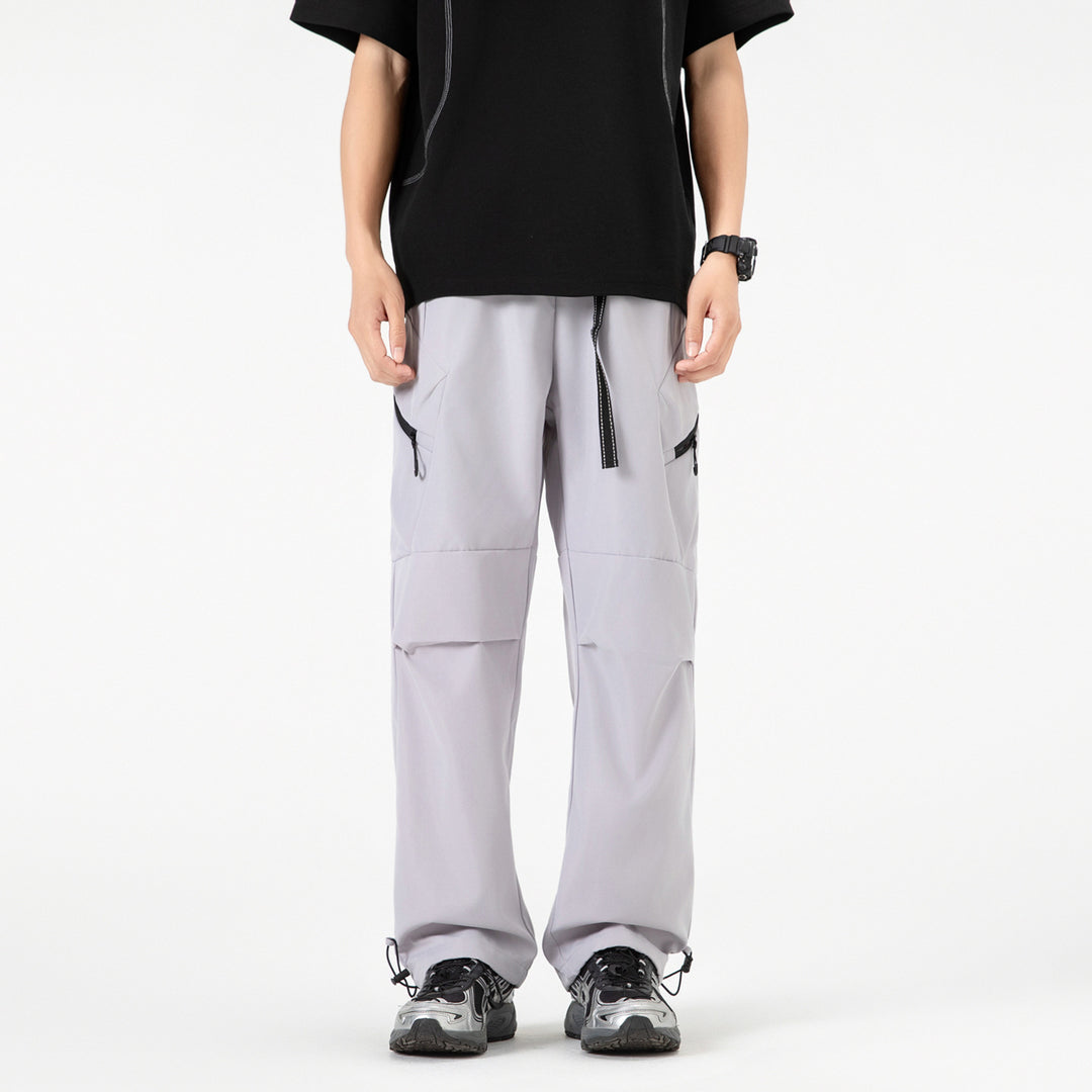 Damen Weite Utility-Cargo-Hose mit Tunnelzugbund, Reißverschluss-Taschen und verstellbaren Beinabschlüssen Mune Fashion