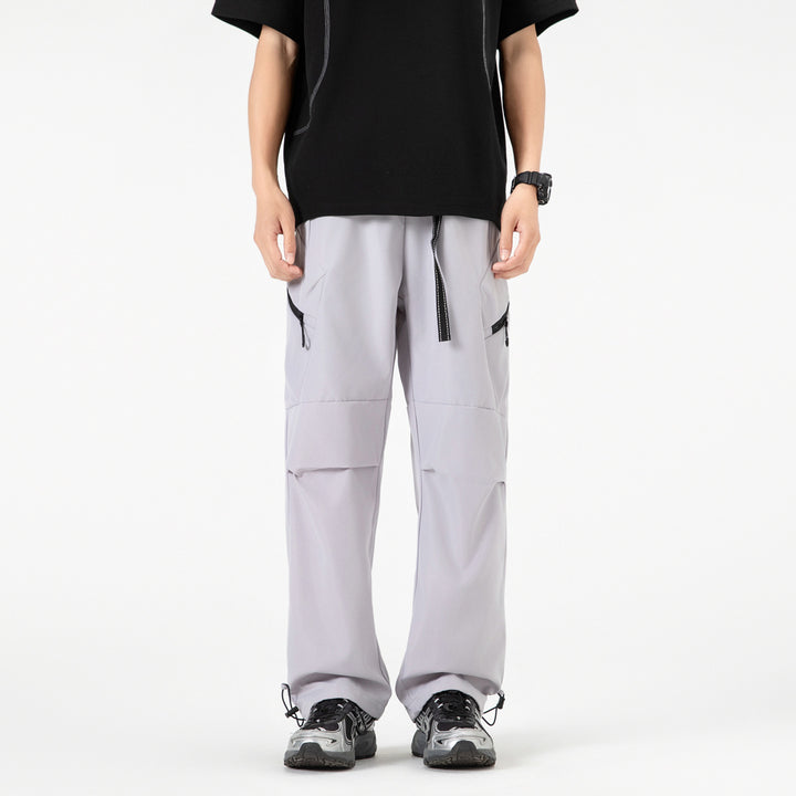 Damen Weite Utility-Cargo-Hose mit Tunnelzugbund, Reißverschluss-Taschen und verstellbaren Beinabschlüssen Mune Fashion