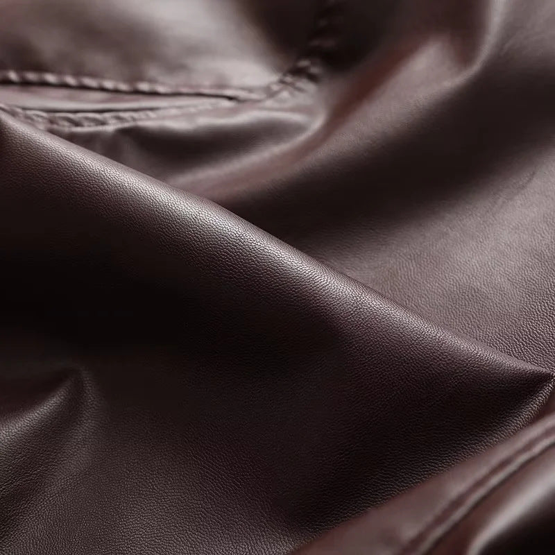 Women's fitted faux leather bomber jacket with large lapel collar, full-length zipper and elastic waistband Mune Fashion
