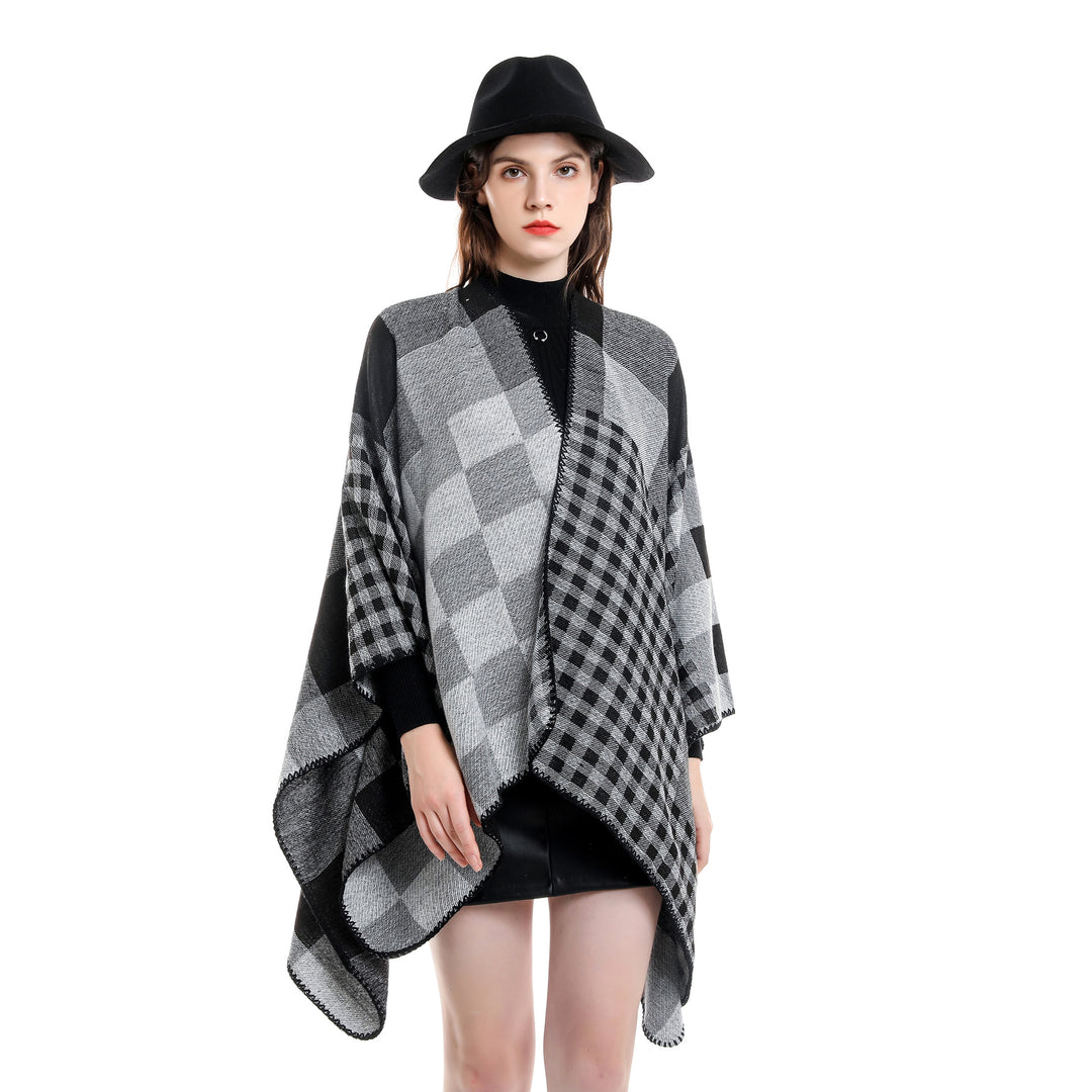 Women's oversized cape in plaid mix made of wool blend with crochet trim Mune Fashion