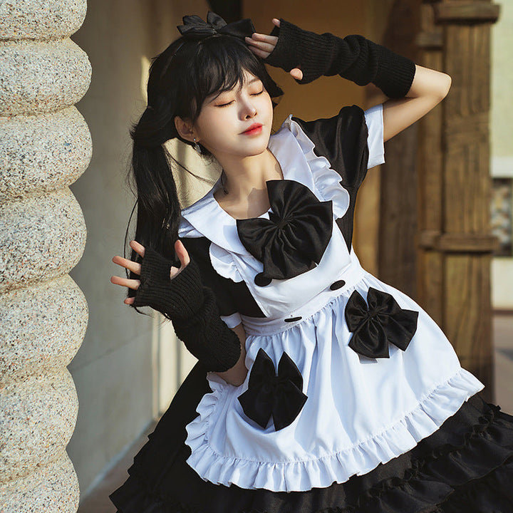 Ladies playful costume dress with ruffle details Mune Fashion