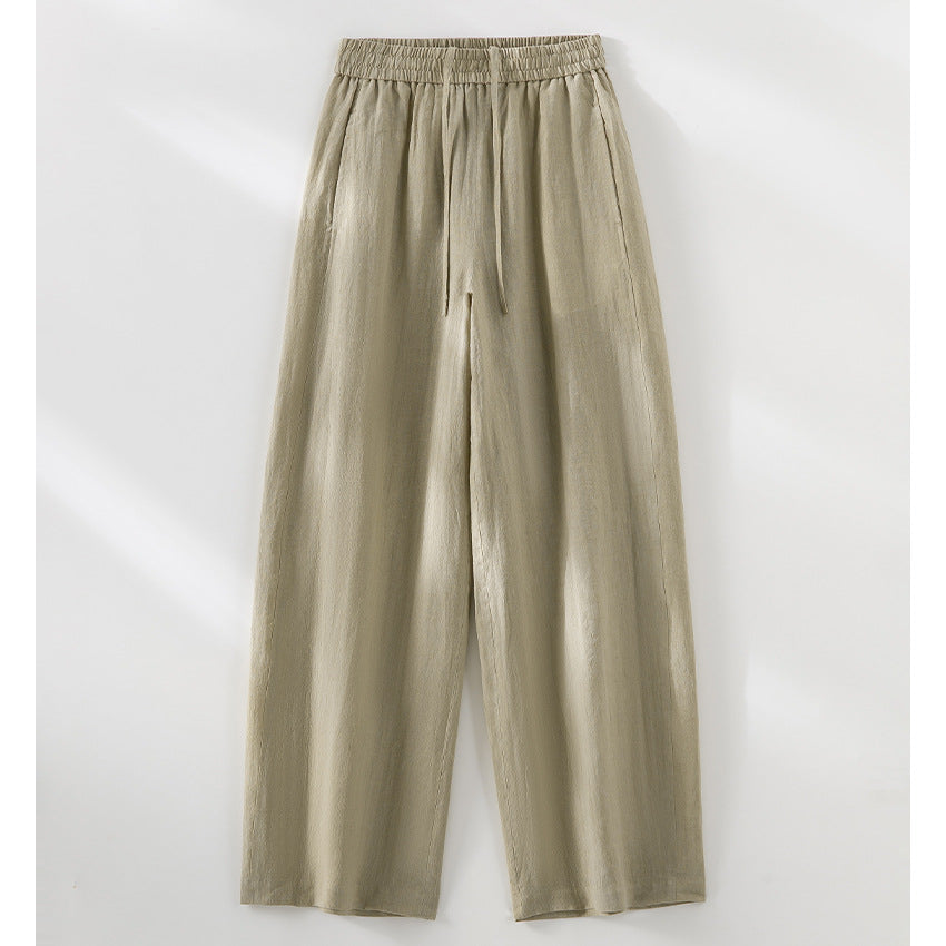 Women's wide linen look trousers with high elastic waistband and flowing wide leg silhouette Mune Fashion