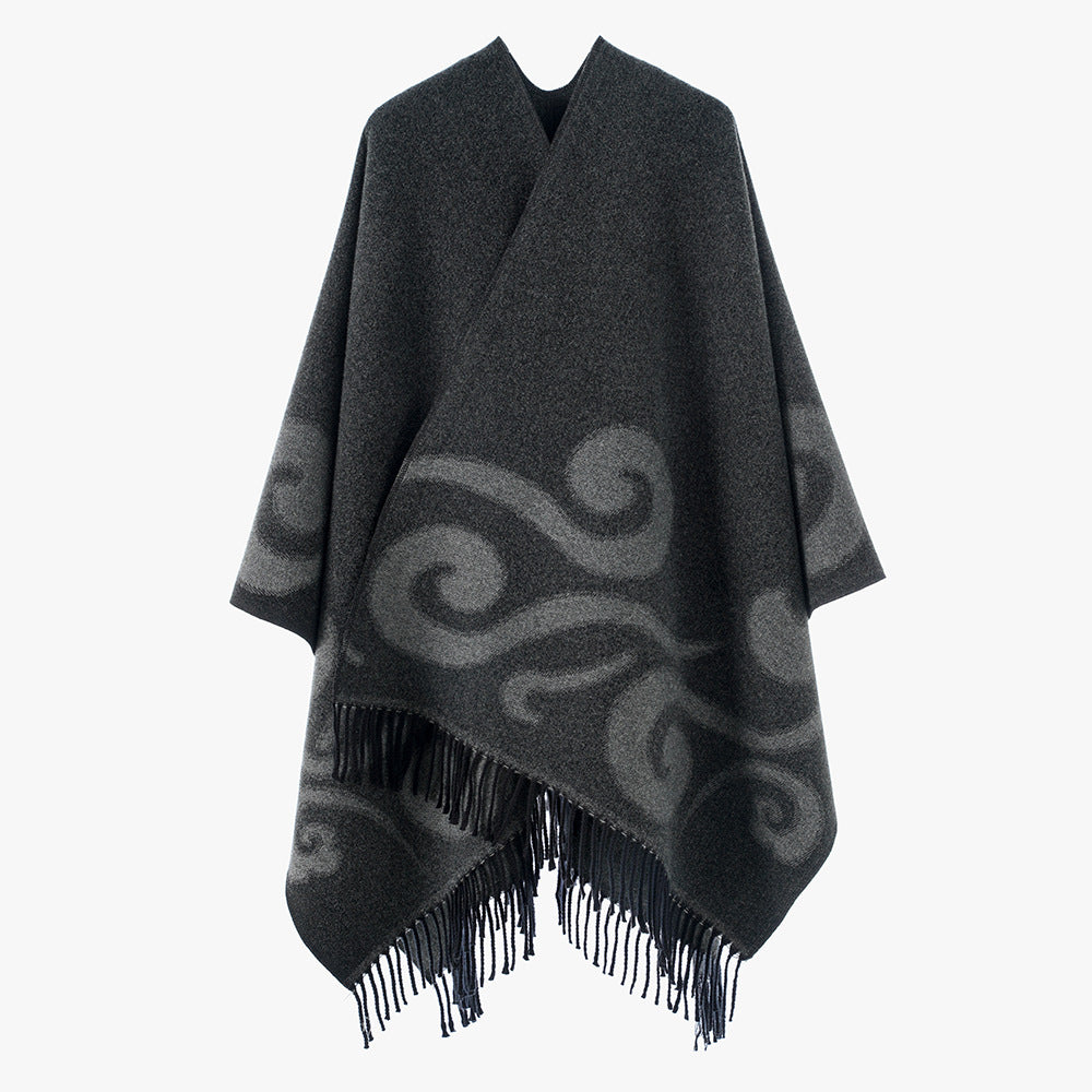 Women's wool blend poncho with jacquard swirl pattern, V-neck and fringes