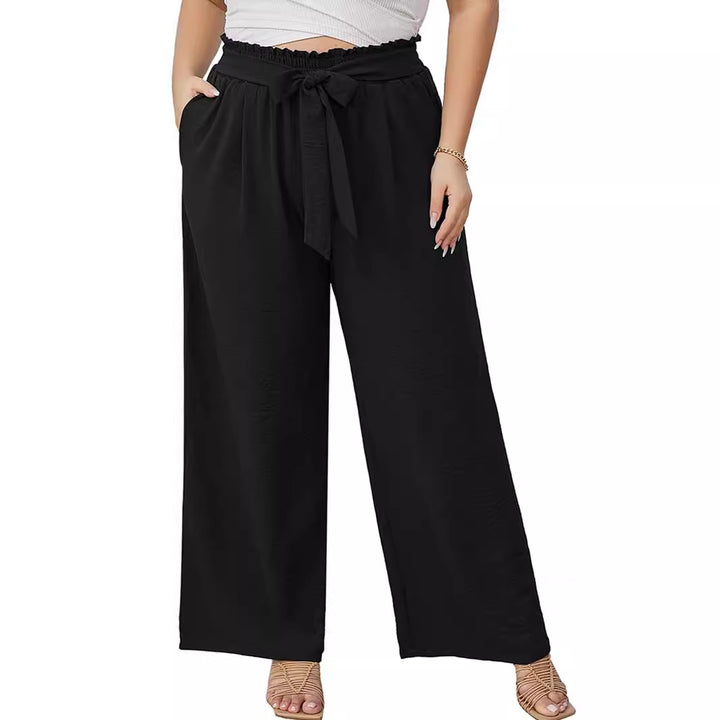 Women's paperbag pants with wide leg, elastic waistband, tie belt, and side pockets Mune Fashion
