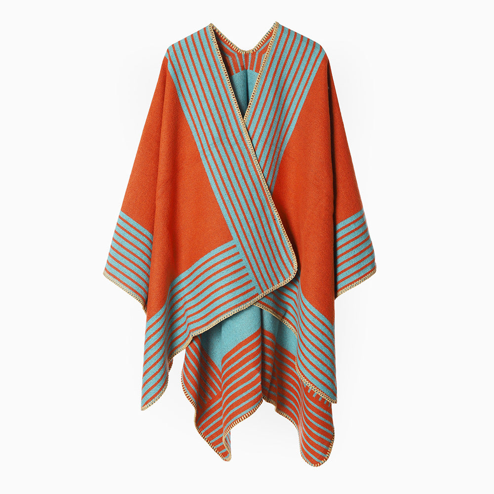 Women's knit poncho made of wool blend with striped jacquard and asymmetrical pointed hem Mune Fashion