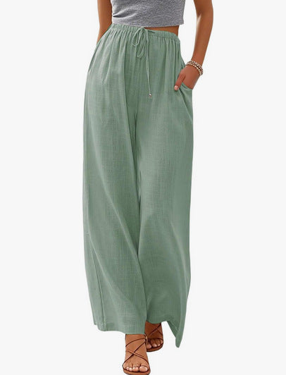Women's wide linen pants with elastic waistband, drawstring, and side pockets Mune Fashion