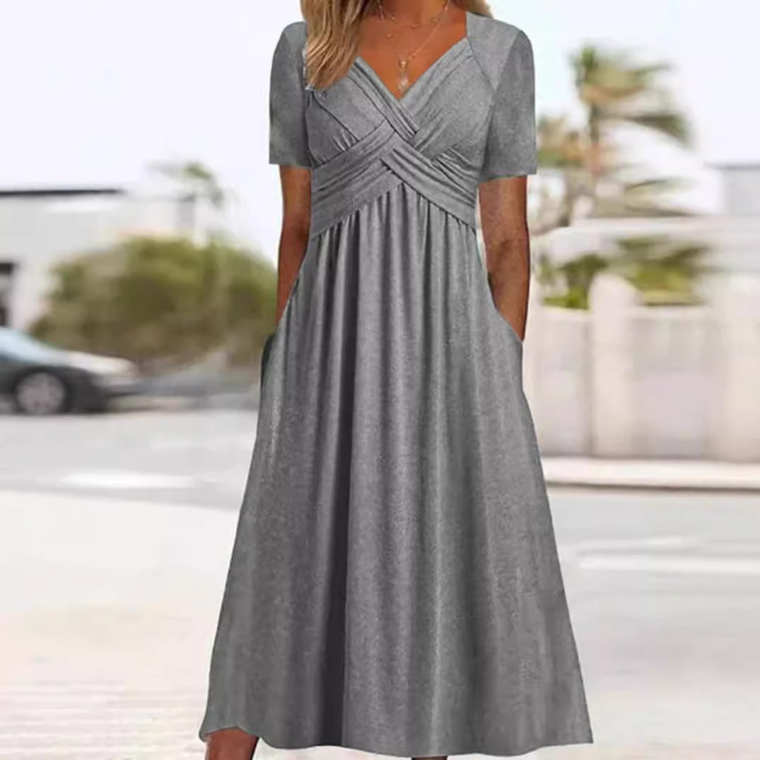 Women's flowing maxi dress with crossed yoke V-neck short sleeves and side pockets Mune Fashion