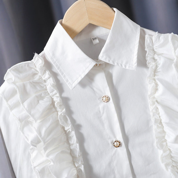 Girls blouse with ruffle details and elegant puff sleeves Mune Fashion
