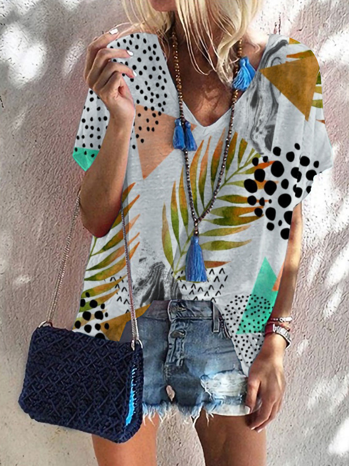 Ladies V-neck top with colorful graphic pattern Mune Fashion