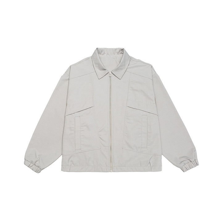 Unisex short jacket in boxy cut with continuous zipper and flap pockets Mune Fashion