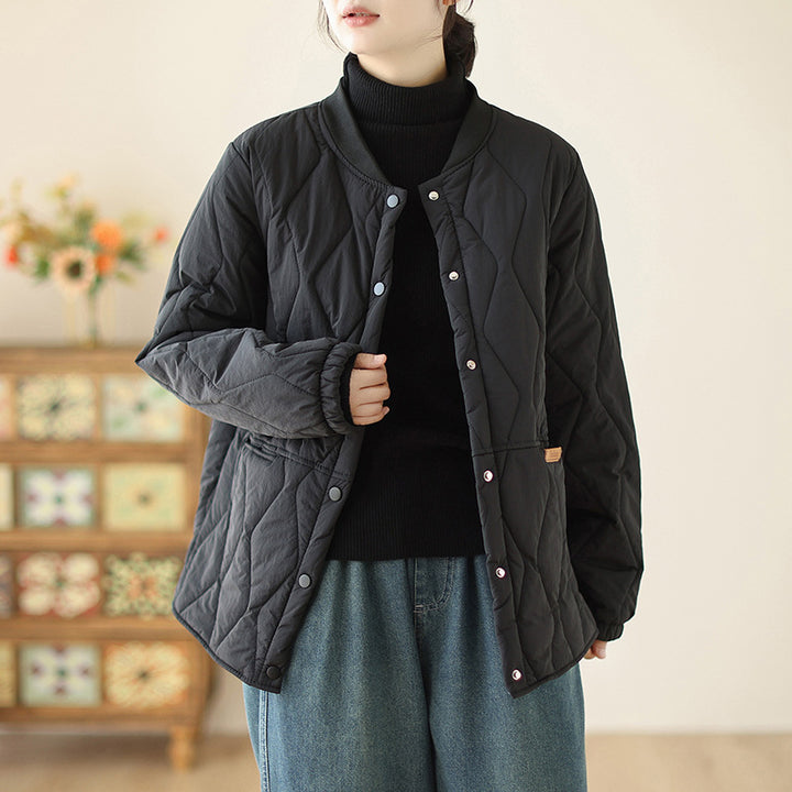Women's lightweight padded transitional jacket with oversized cut, elastic sleeve cuffs and concealed snap button placket Mune Fashion