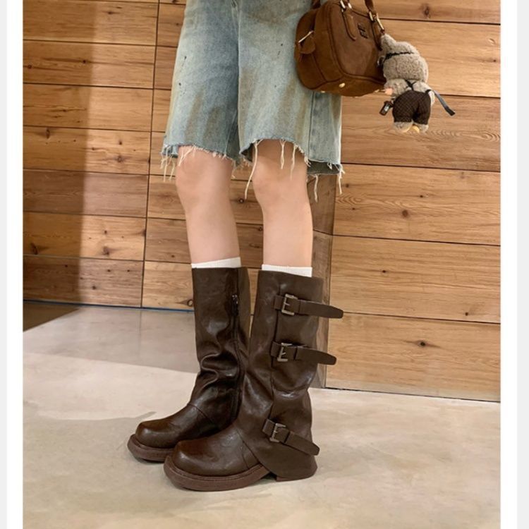 Women's knee-high slouch boots made of synthetic leather with adjustable buckles and textured platform heel Mune Fashion