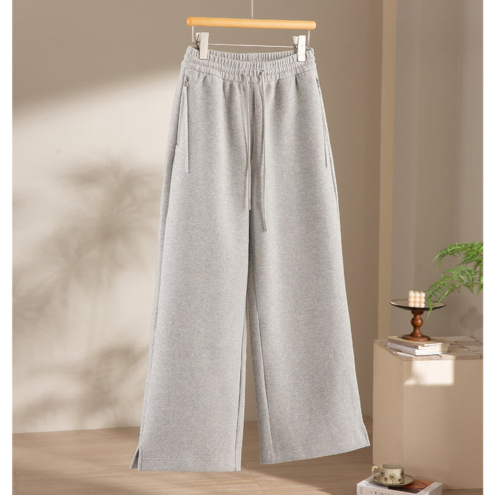 Women's wide French-Terry lounge sweatpants with high waistband, drawstring and side slits Mune Fashion