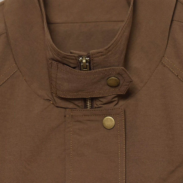 Women’s transitional jacket with standing collar, drawstring and utility pockets Mune Fashion
