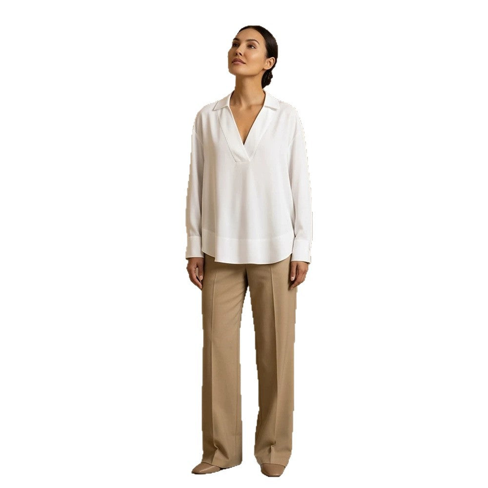 Women's loose-fitting tunic blouse with V-neck, shirt collar, and extended back hem Mune Fashion