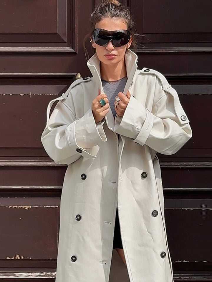 Women's waistless long trench coat in oversized cut with double button placket and shoulder epaulettes Mune Fashion