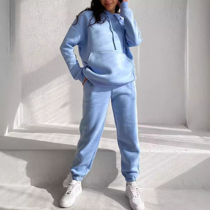 Women's Oversize Loungewear Set made of soft cotton blend fleece with hoodie and tapered jogging pants Mune Fashion
