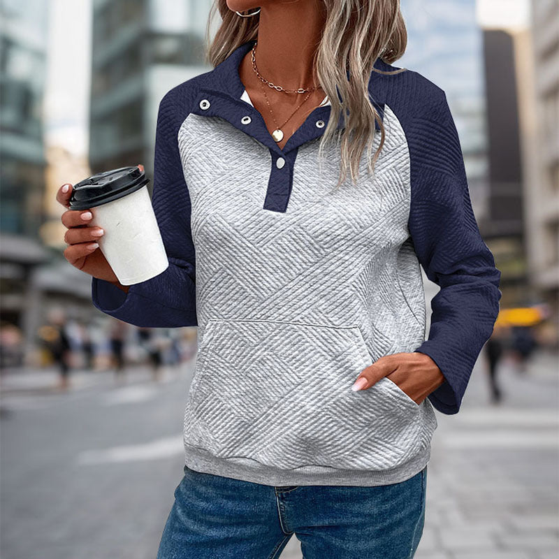 Women's quilted sweatshirt with Henley button placket, kangaroo pocket, and contrasting raglan sleeves Mune Fashion