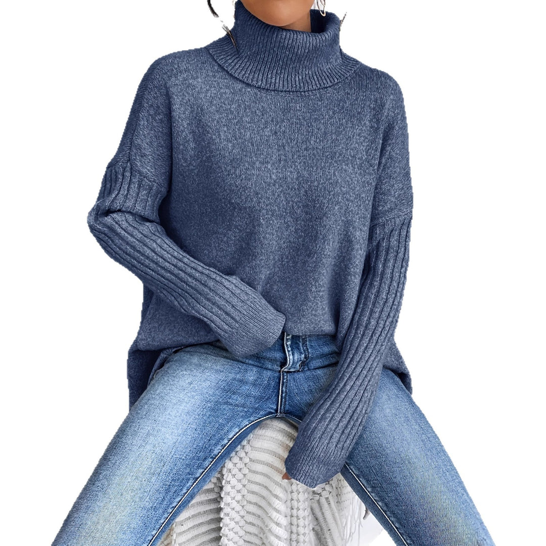 Women's oversized knit sweater with high turtleneck, ribbed sleeves, and asymmetric hem Mune Fashion