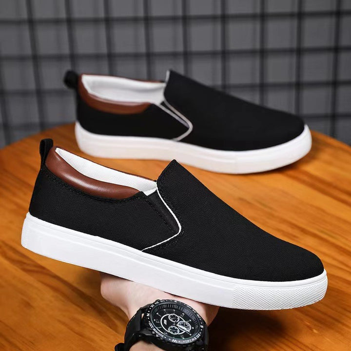 Men's nan Canvas Slip-On Sneaker with elastic inserts, padded heel collar and lightweight EVA sole Mune Fashion