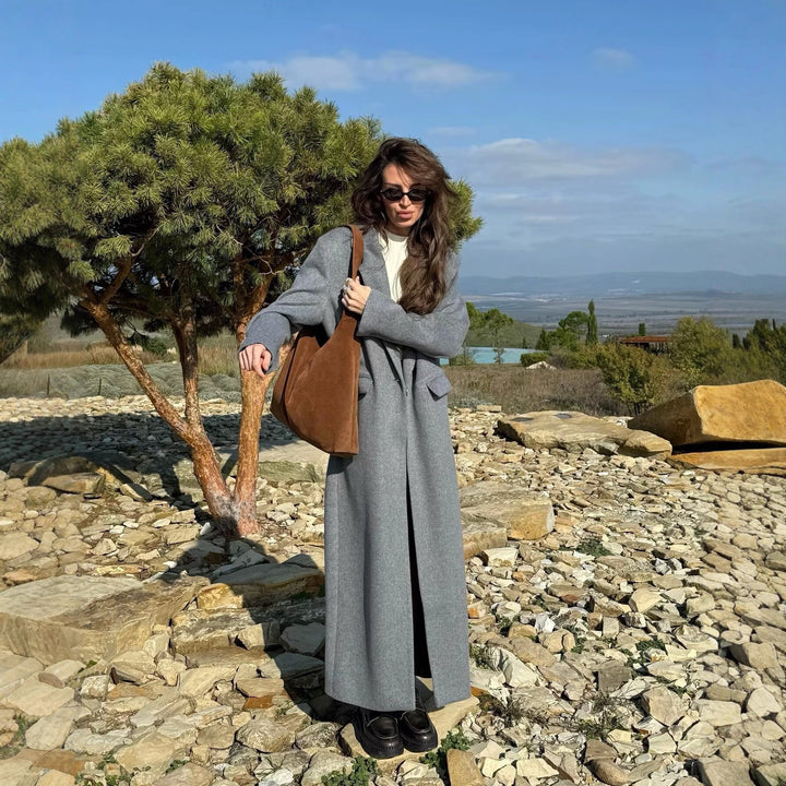 Women's long coat made of wool blend with oversized silhouette, shawl collar and patch pockets Mune Fashion