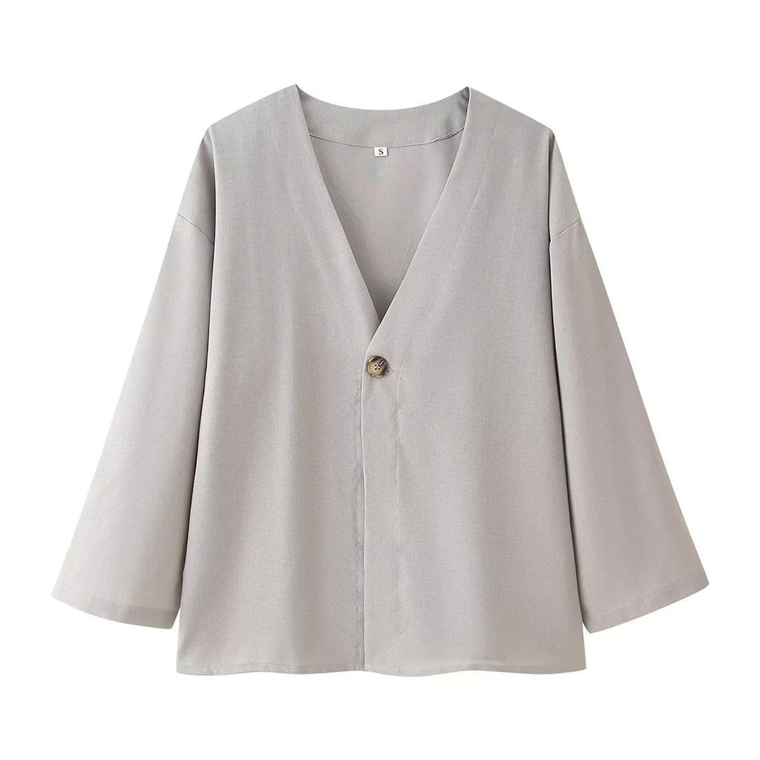 Women's casual two-piece set with V-neck blouse and wide waistband pants Mune Fashion