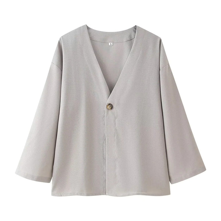 Women's casual two-piece set with V-neck blouse and wide waistband pants Mune Fashion