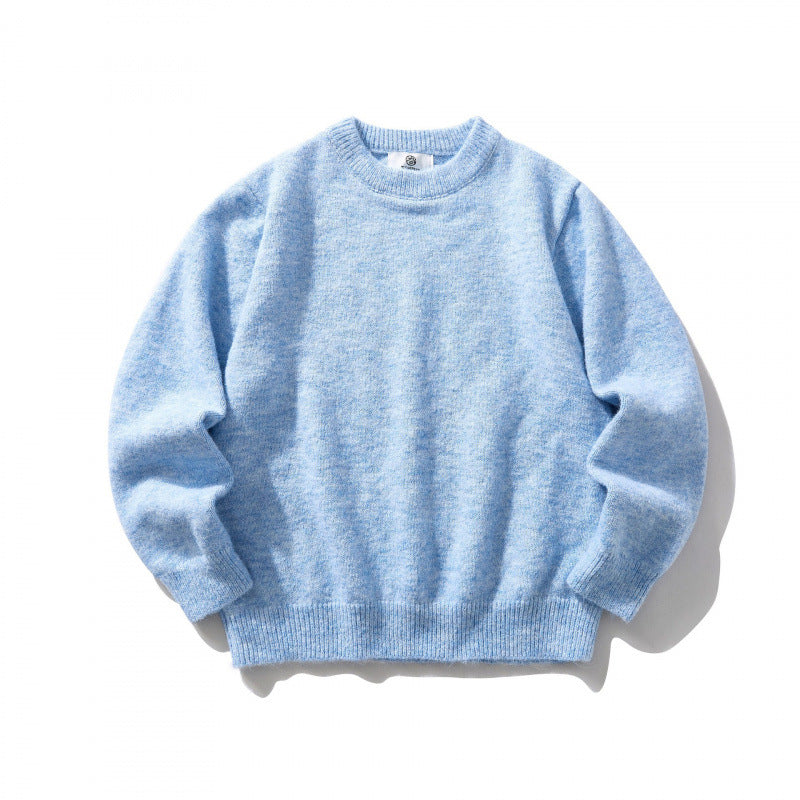 Unisex Oversize fine knit sweater with round neckline, ribbed cuffs, and mottled wool blend Mune Fashion