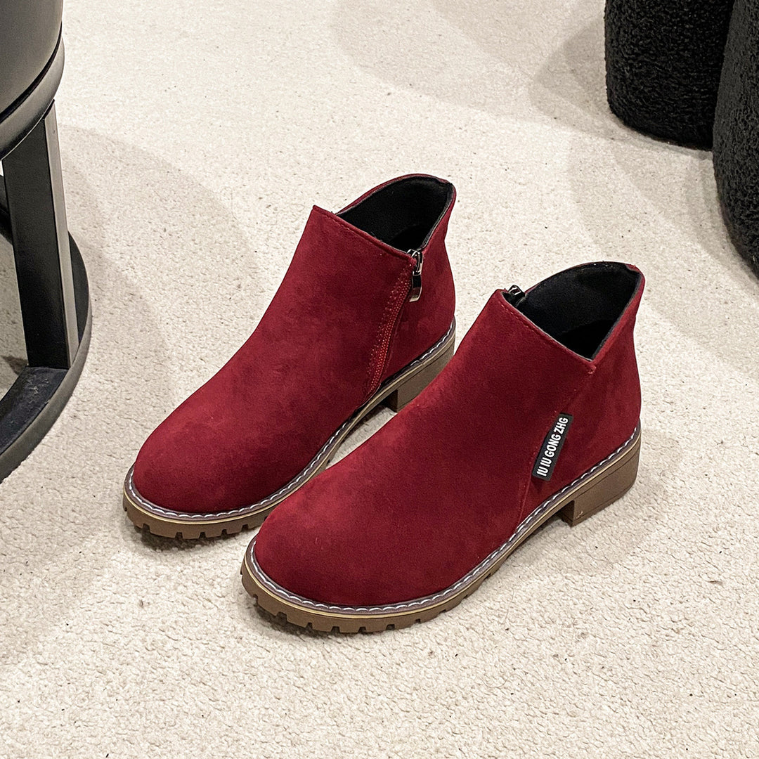 Ladies short zip ankle boot made of suede look with profiled tractor sole system and padded comfort lining Mune Fashion