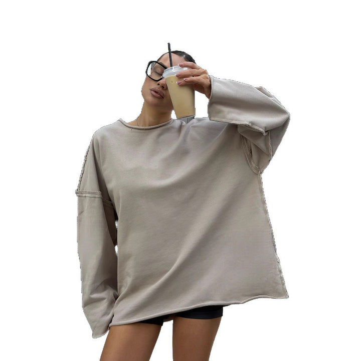 Ladies ultra-wide relax sweatshirt with frayed seams and asymmetric hem Mune Fashion