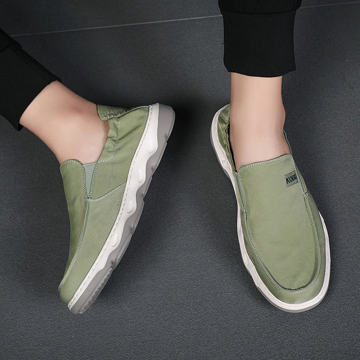 Men's elastic nubuck-look slipper with padded heel trim and shock-absorbing wave outsole Mune Fashion