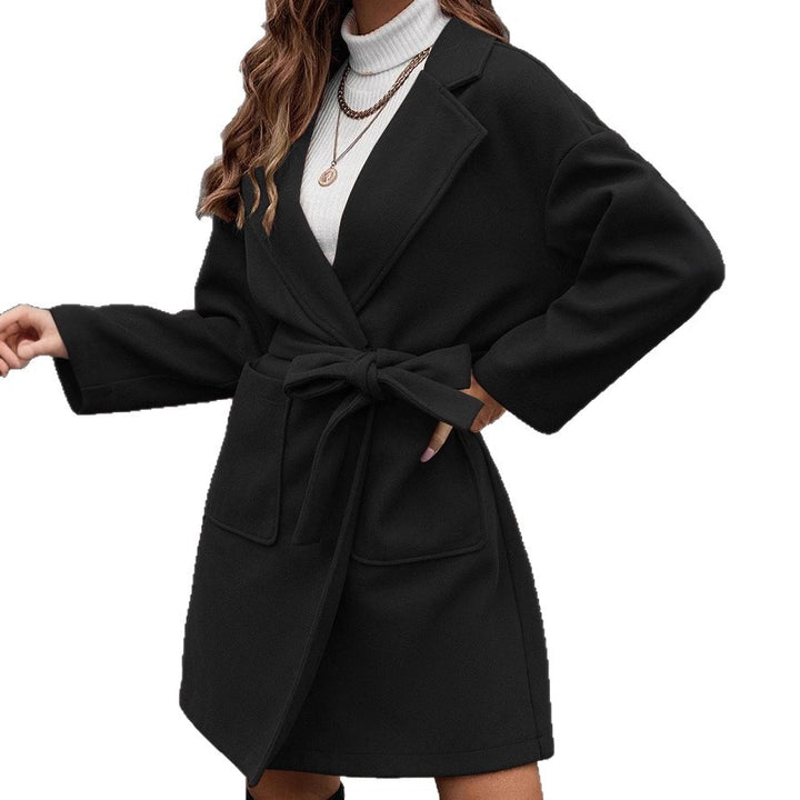 Ladies wrap coat with tie belt, large flap pocket and lapel collar Mune Fashion