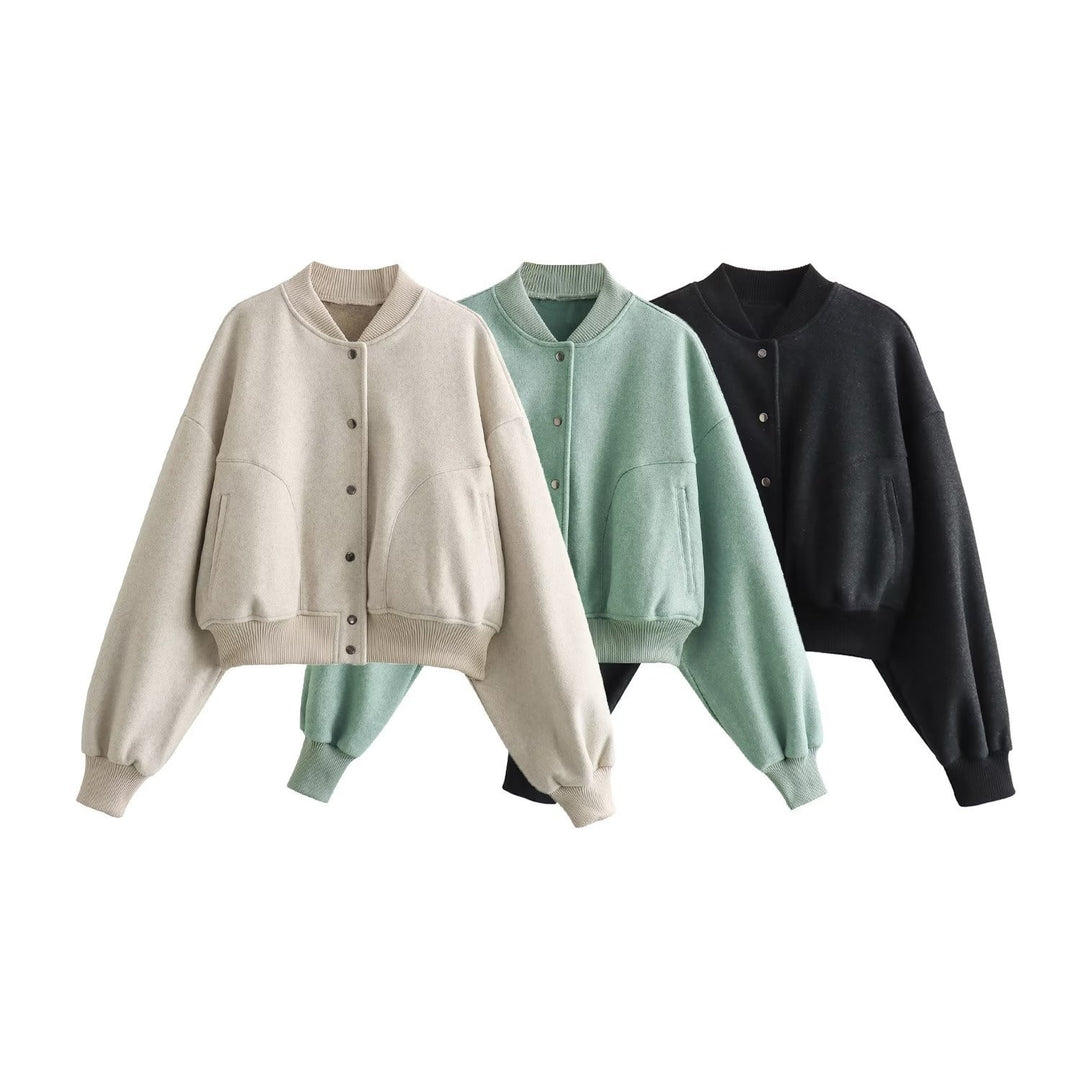 Women's short utility bomber jacket with patch pockets, concealed snap button placket, and elastic ribbed cuffs Mune Fashion
