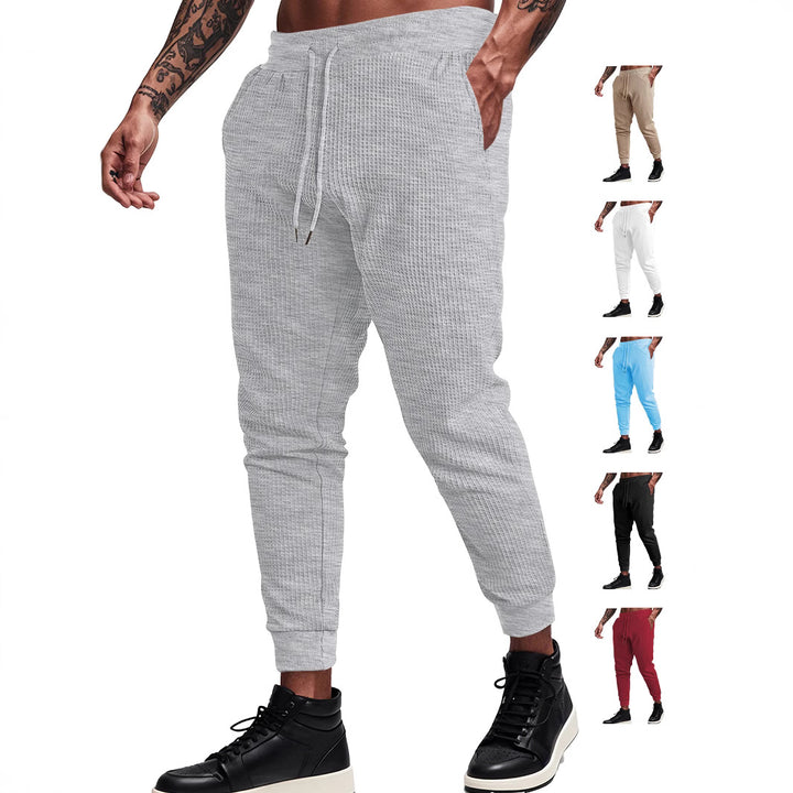 Men's fine-structured jersey lounge pants tapered cut with drawstring waistband and ribbed leg openings Mune Fashion