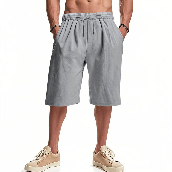 Men's casual bermuda shorts made of cotton blend with elastic waistband, drawstring, and side pockets Mune Fashion