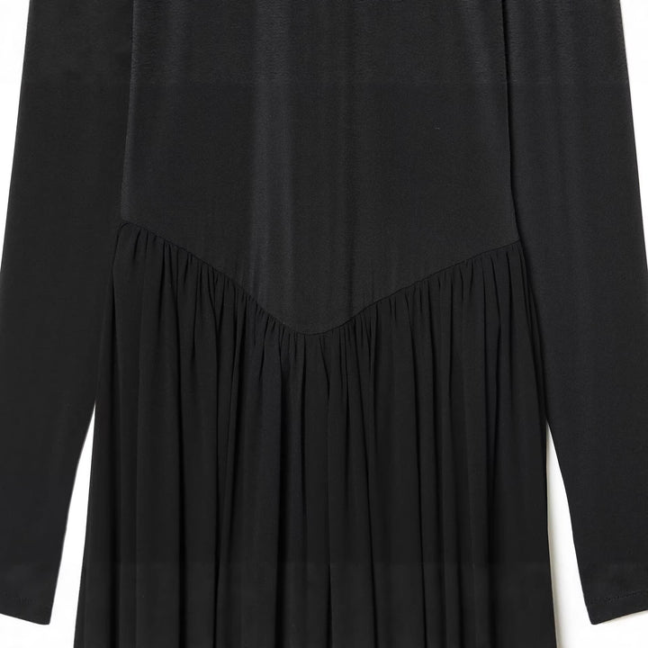Women's jumpsuit with stand-up collar, wide pleated pant leg and ankle ties Mune Fashion