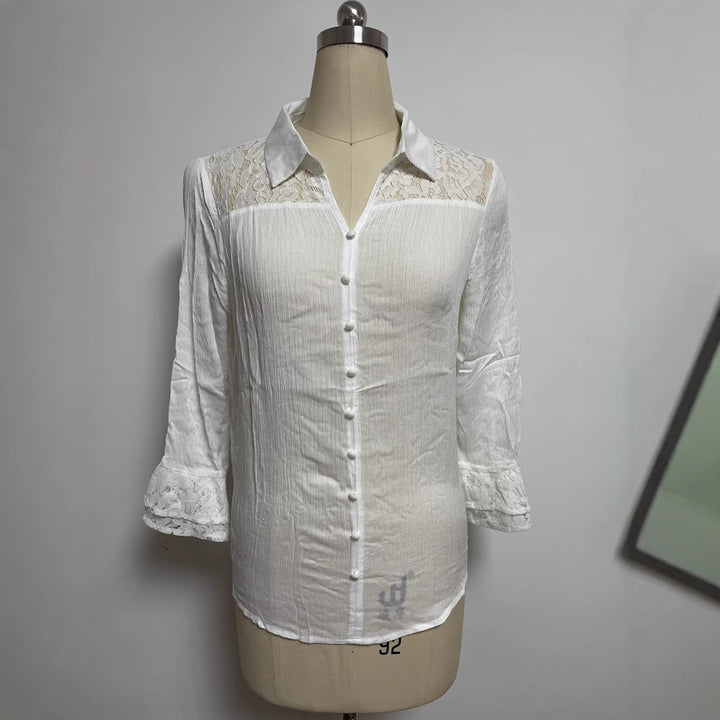 Ladies' semi-transparent crepe blouse with lace yoke, fabric-covered buttons, and three-quarter flounce sleeves Mune Fashion