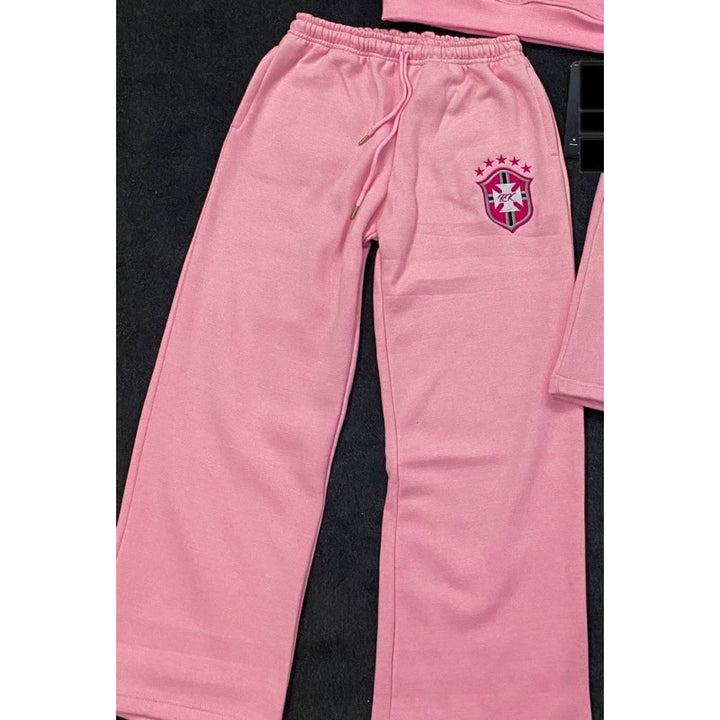 Women's loose jogging pants with elastic waistband, drawstring, and embroidered emblem Mune Fashion
