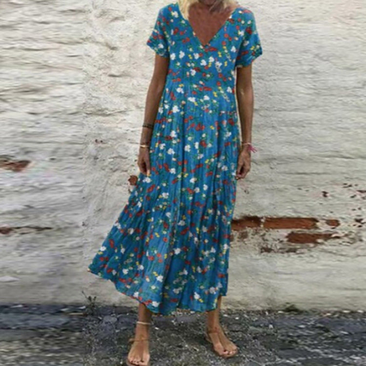 Women’s V-neck maxi dress with fine pleated skirt, empire bodice and short sleeves Mune Fashion