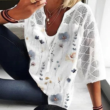 Women's V-neck tunic with lace-knit sleeves and subtle watercolor floral print Mune Fashion