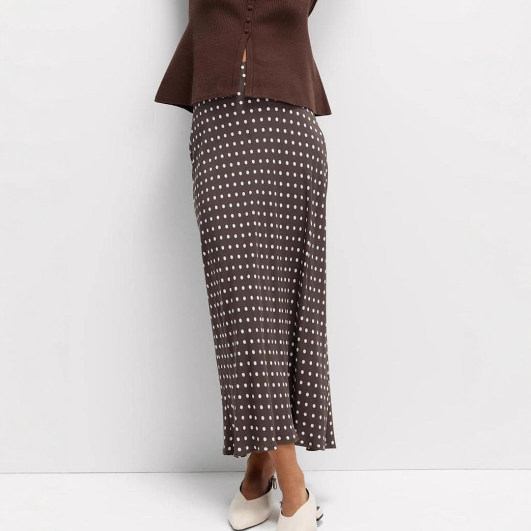 Women's midi skirt with polka dot pattern, asymmetrical hem and side slit Mune Fashion